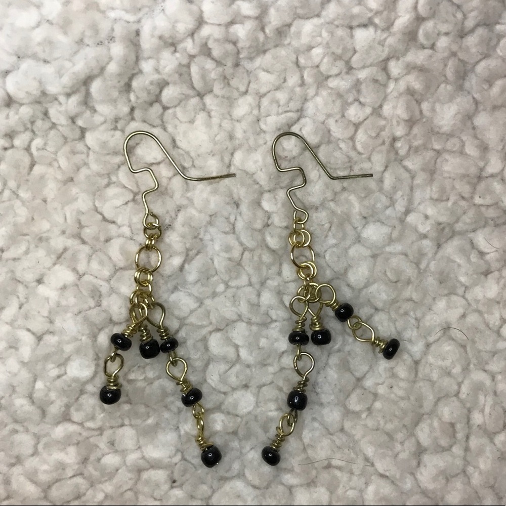 Intricate black beaded dangly earrings